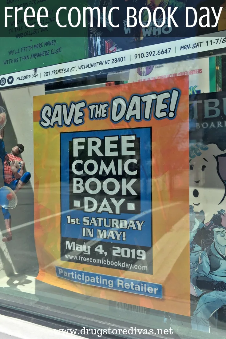 A poster about free comic book day in a store window with the words 