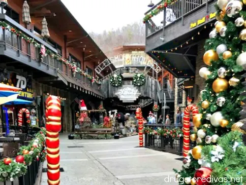 The outside of the Ole Smoky Moonshine Distillery in Gatlinburg, TN decorated for Christmas.
