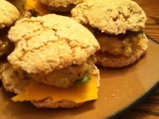 Four Jalapeno Cheddar Sliders on a plate.