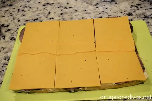 Slices of cheese spread on bread.