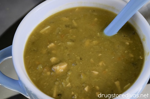A bowl of slow cooker split pea soup with chicken.