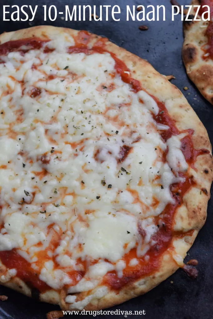 Two naan pizzas on a black background with the words "Easy 10-MInute Naan Pizza" digitally written on top.
