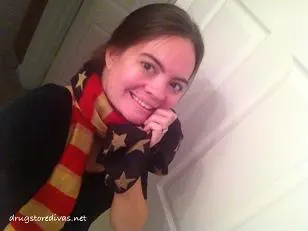 A woman wearing an American Flag scarf.