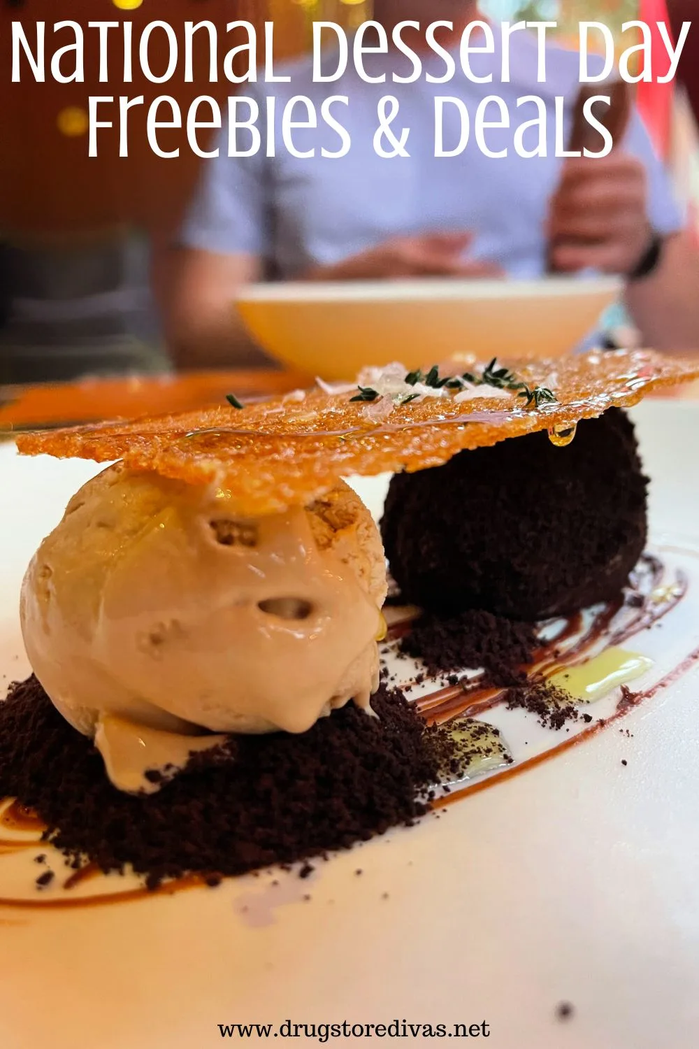 A fancy ice cream dessert on a plate with the words 