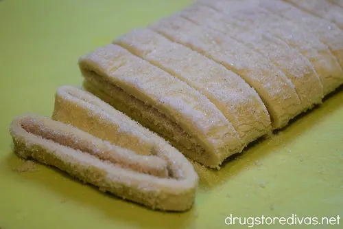 Elephant ear cookie dough cut into slices.