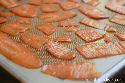 Carrot slices on a baking sheet.