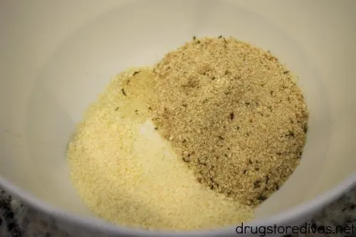 Lemon juice, parmesan cheese, and breadcrumbs in a bowl.