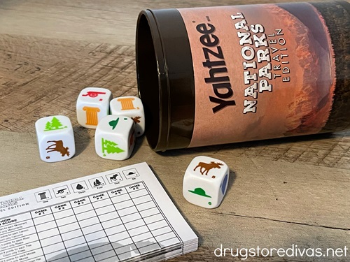 A National Park Yahtzee spread out on a wooden table.