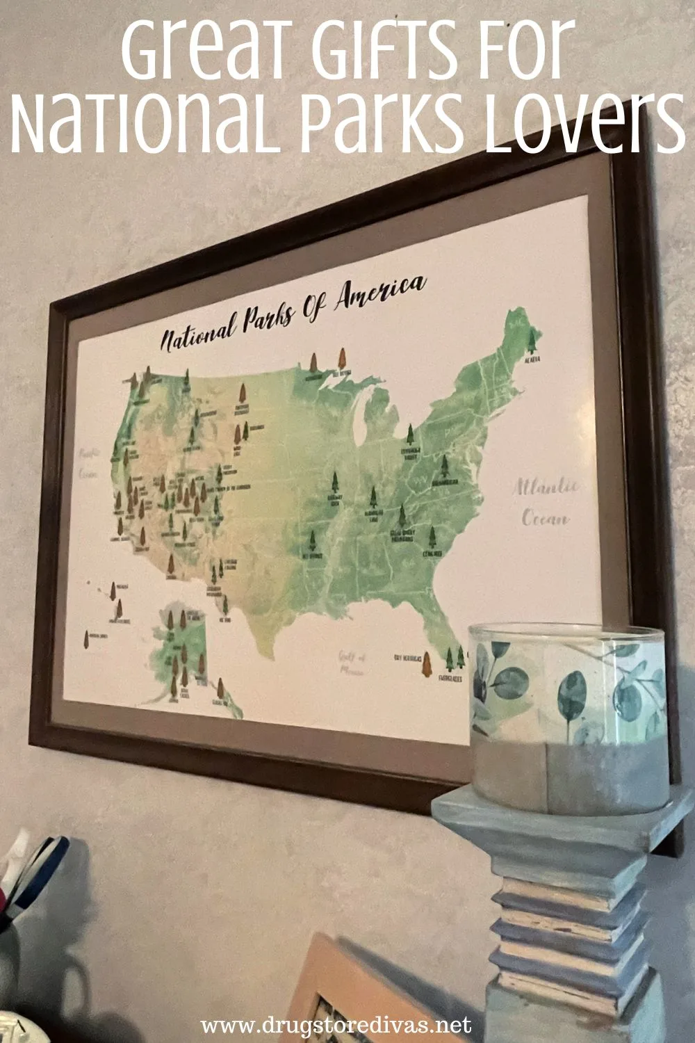 A map of the United States hanging on a wall with the words 