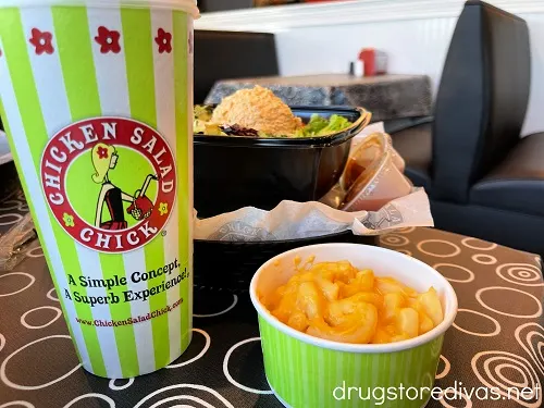 A chicken salad, macaroni and cheese, and a drink from Chicken Salad Chick on a table.