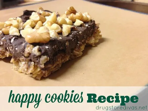Up your cookie game with these Happy Cookies (rolled oat cookie bars topped with chocolate and nuts) from www.drugstoredivas.net. They are THE BEST cookie you will ever make!