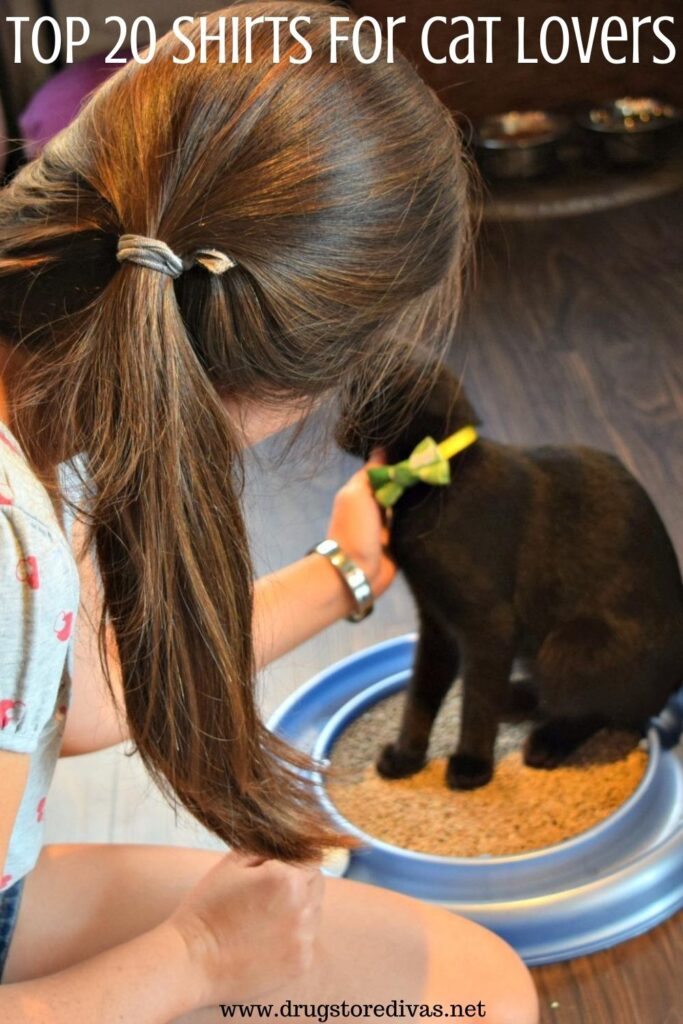 Woman petting a cat with the words "Top 20 Shirts For Cat Lovers" digitally written on top.