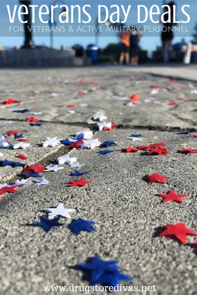 Red, white, and blue star-shaped confetti on the ground with the words "Veterans Day Deals For Veterans & Active Military Personnel" digitally written on top.