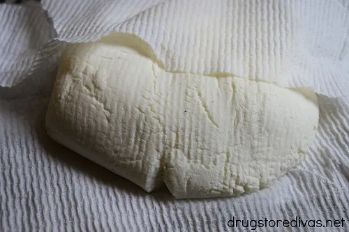 Ricotta cheese on a paper towel.