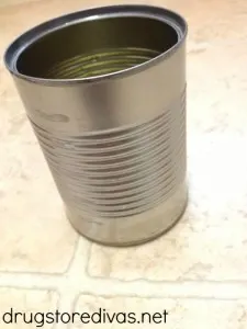 Are you ready for some FOOTBALL?! Get ready for your perfect football party with this homemade football flatware holder -- made from a soup can! It's perfect for your Super Bowl party or your next tailgate.