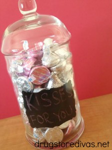 Hershey's Kisses in a glass jar with the words "Kisses For You" written on it.