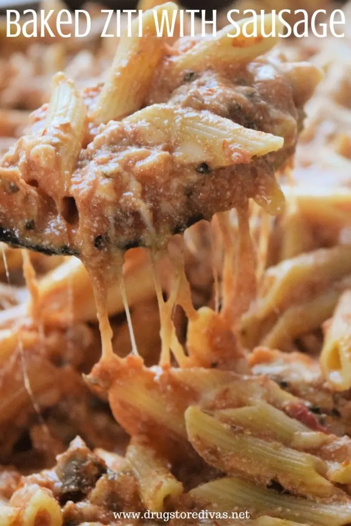 A spoonful of penne noodles and ground sausage with cheese pulling from the spoon with the words "Baked Ziti With Sausage" digitally written on top.