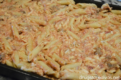 Uncooked baked ziti in a pan.