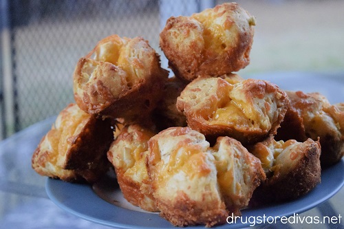 Cheddar Garlic Pull Apart Biscuits piled on a plate.