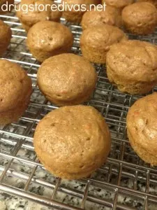 Carrot Cake mini muffins on a wire rack.