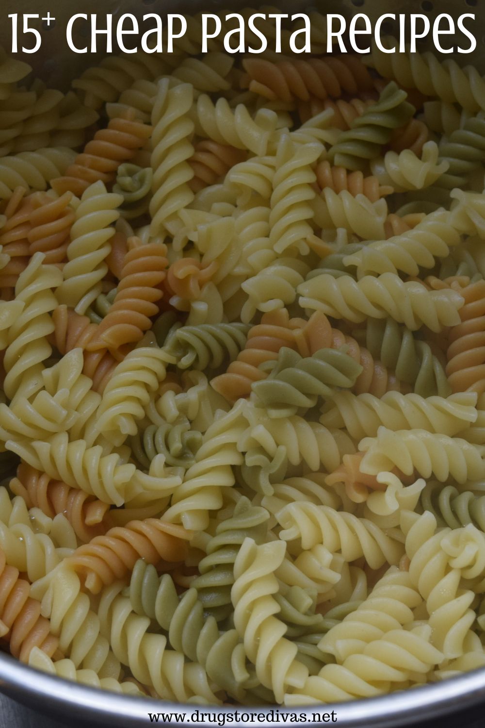 Tri-colored pasta in a strainer with the words 