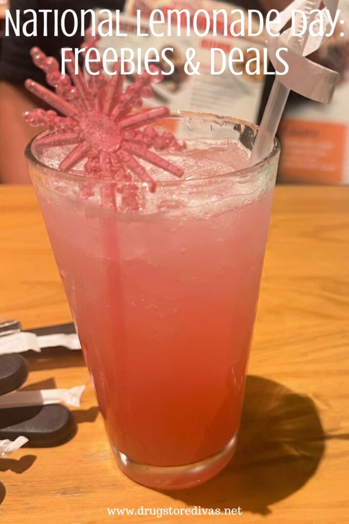A glass of pink lemonade with a stirrer in it and the words "National Lemonade Day: Freebies & Deals" digitally written on top.
