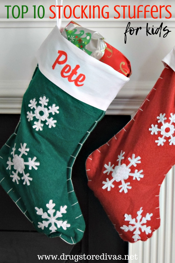 Two stockings hanging, a green one that says Pete and a red one, with the words "Top 10 Stocking Stuffers For Kids" digitally written above it.