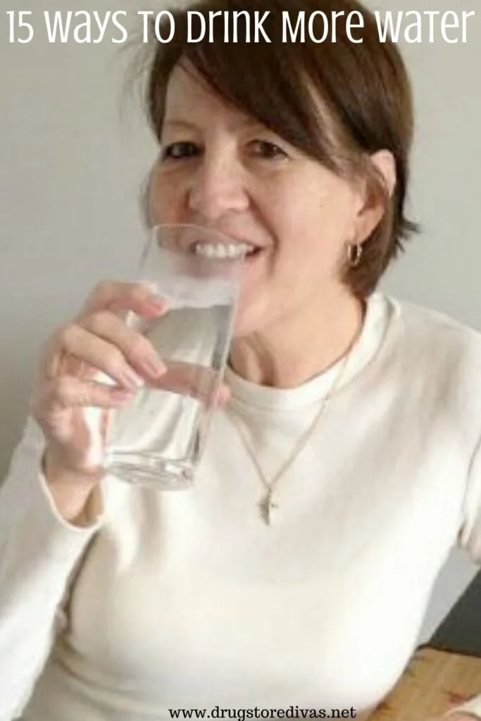 A woman drinking water with the words "15 Ways To Drink More Water" digitally written above her.