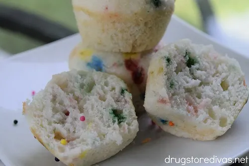 Funfetti muffins on a small plate.