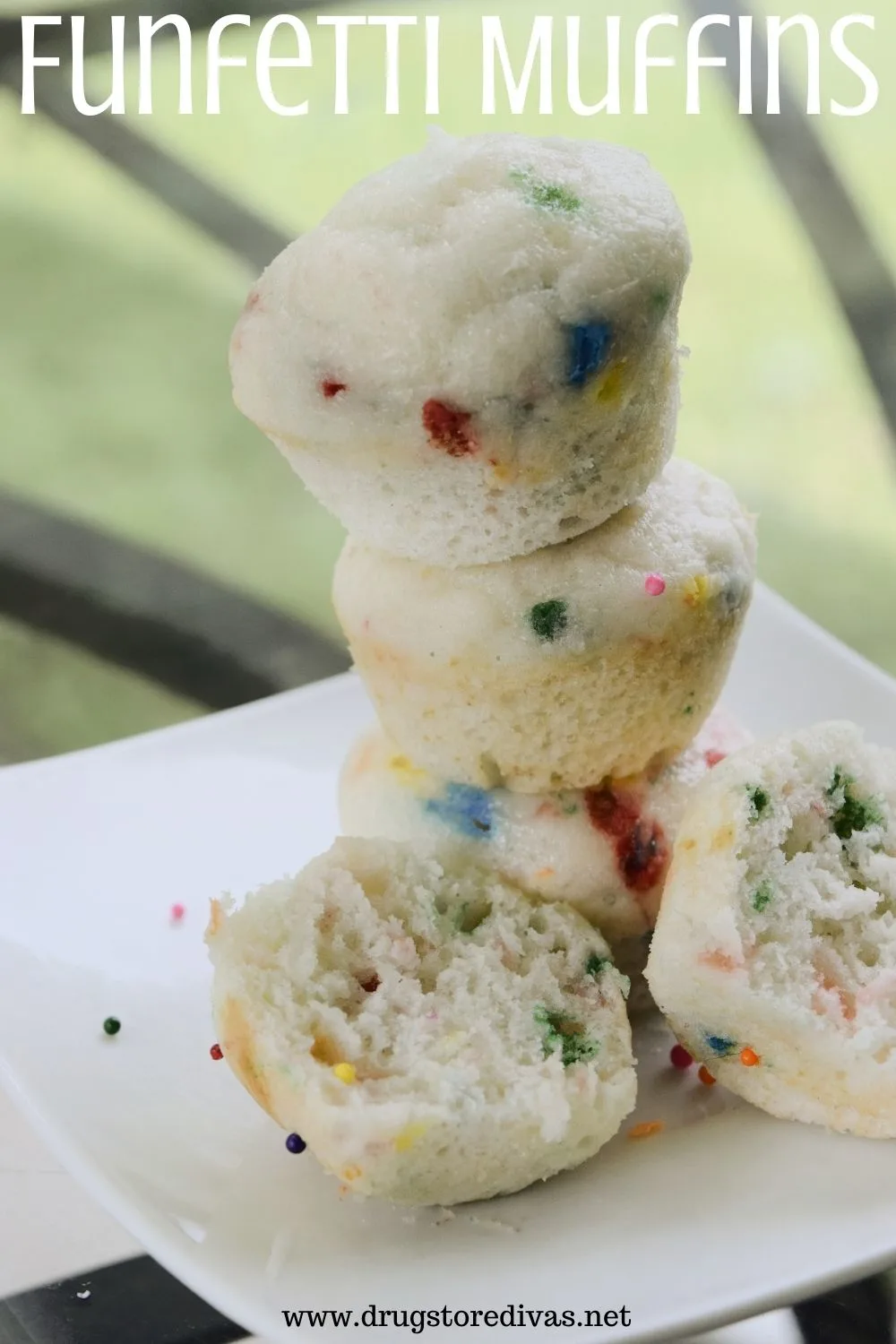 Funfetti muffins piled on a plate with the words 