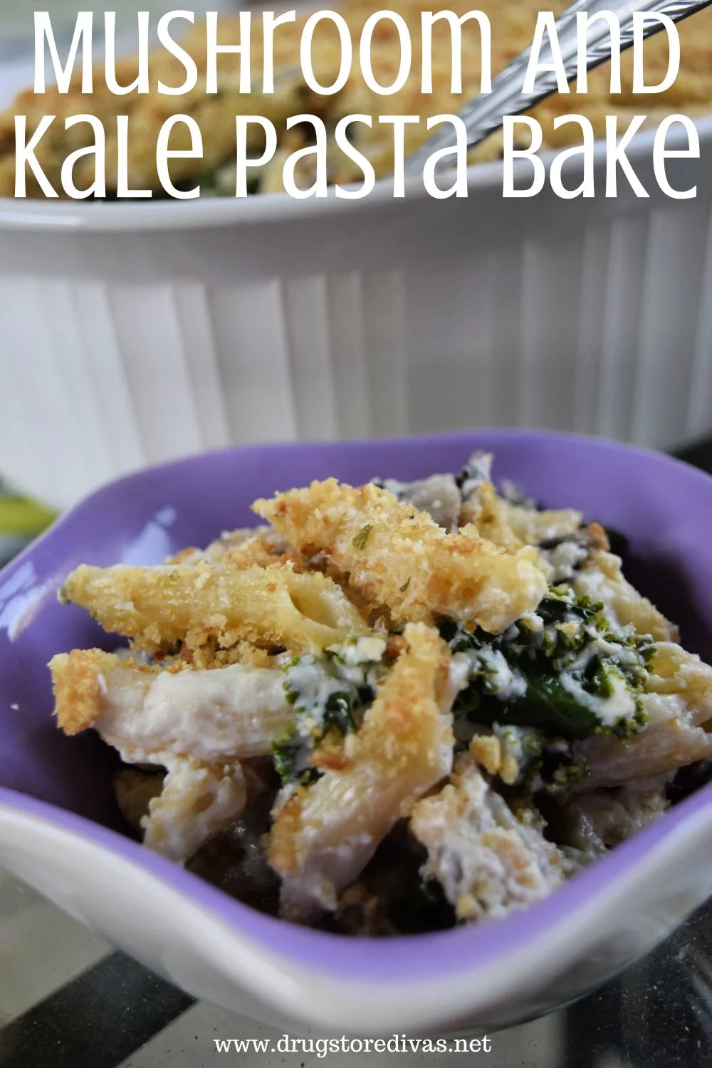 Penne pasta with kale, mushrooms, and a crunchy topping in a purple bowl with a casserole pan behind it and the words 