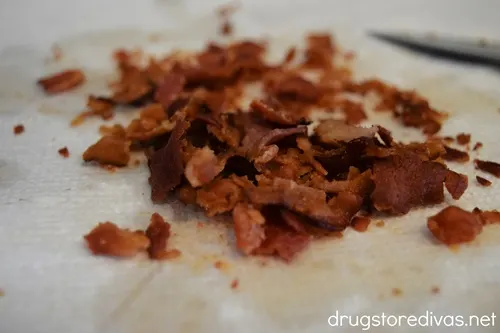 Chopped bacon on a paper towel.