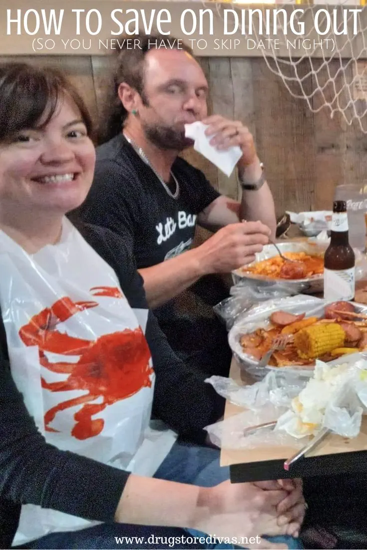 A man and a woman in a booth at a crab boil restaurant with food on the table in front of them and the words 
