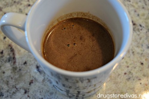 Coffee in a mug on a counter.