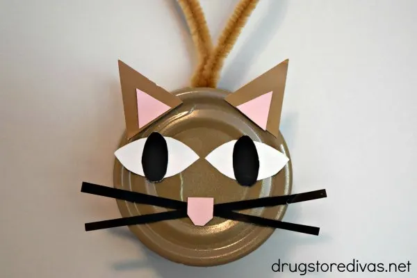 #ad Looking for a fun and festive way to upcycle? Check out this DIY Cat Food Can Christmas Ornament from www.drugstoredivas.net. #PetSmartCart