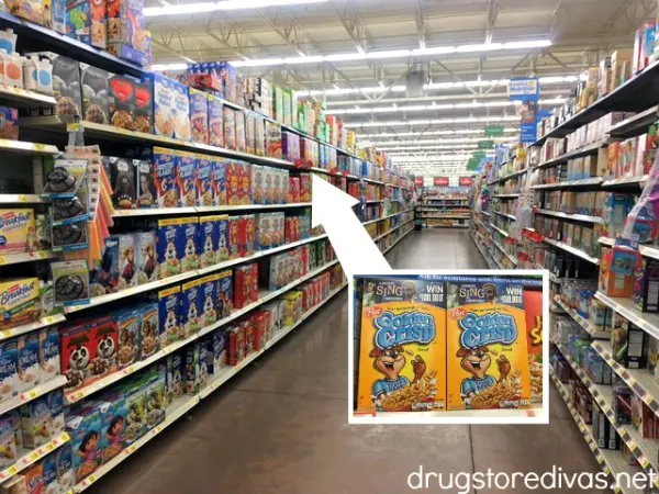 Golden Crisp Cereal in an aisle at the grocery store.