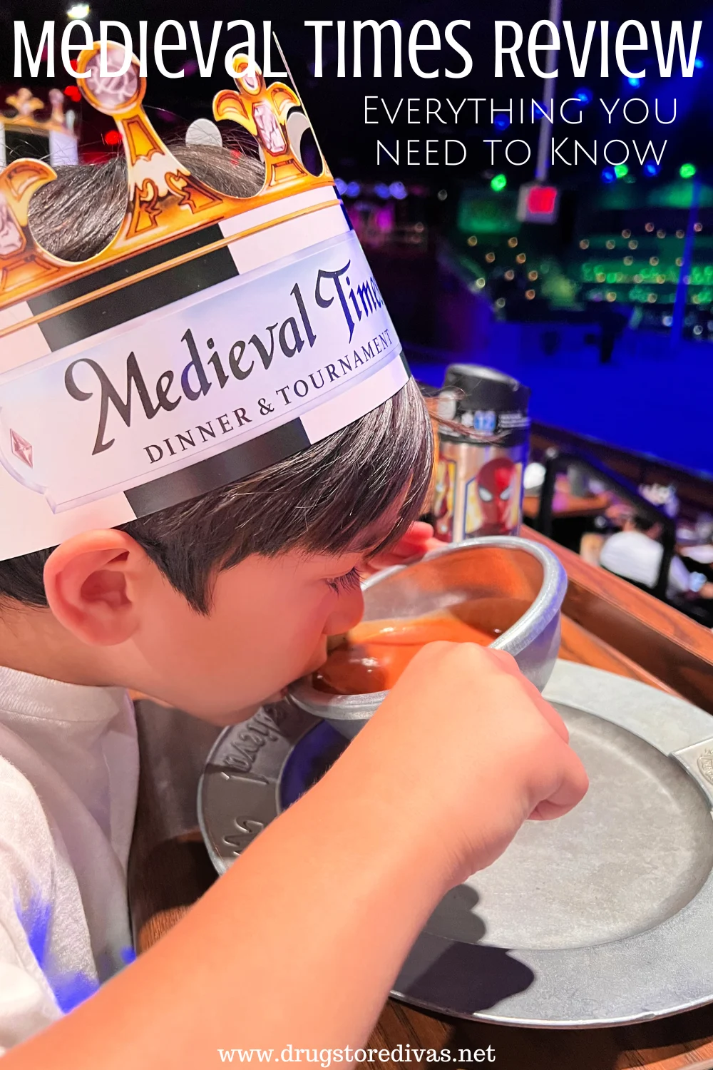 A little boy wearing a crown and drinking tomato soup with the words 