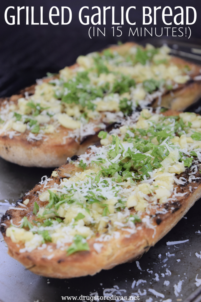 A loaf of bread with garlic, parsley, and cheese on top with the words "Grilled Garlic Bread (in 15 minutes)" digitally written on top.