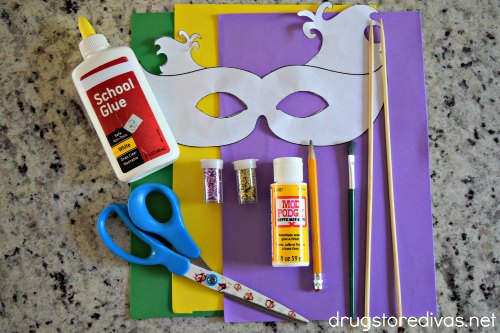 Glue, green, yellow and purple foam, scissors, Mod Podge, a paint brush, pencil, and mask template.