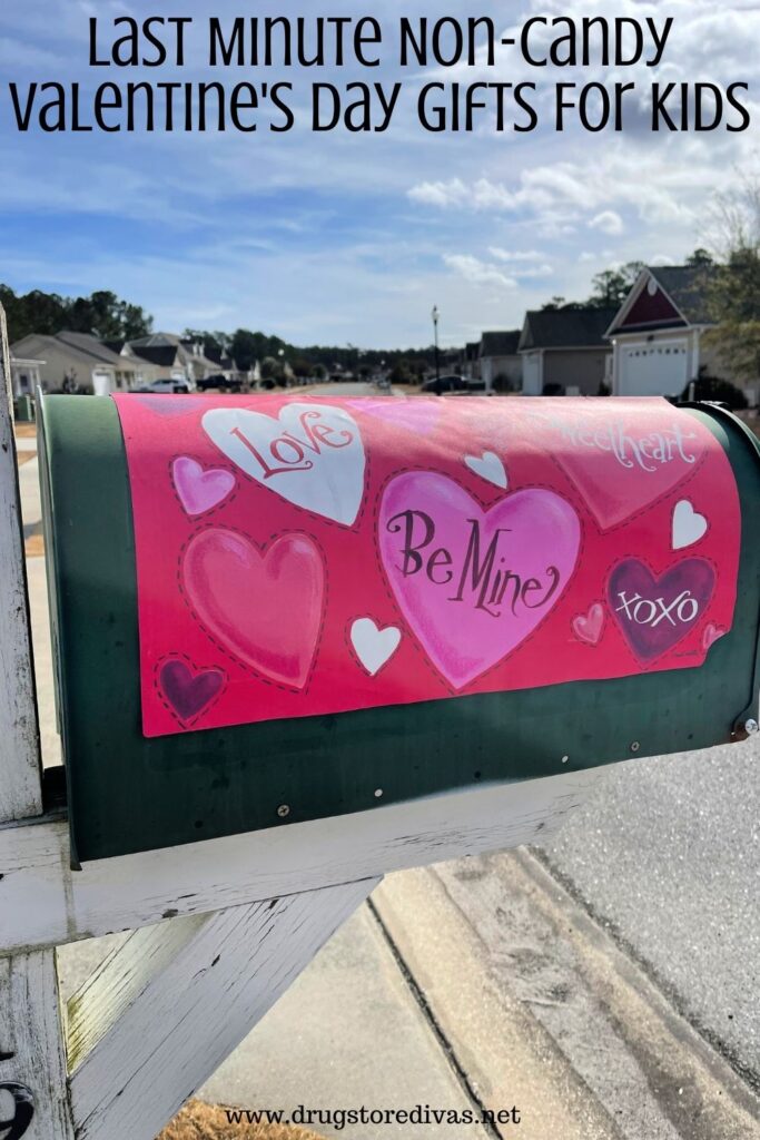 A mailbox wrapped with a Valentine's Day Conversation hearts wrapped with the words "Last Minute Non-Candy Valentine's Day Gifts For Kids" digitally written on top.