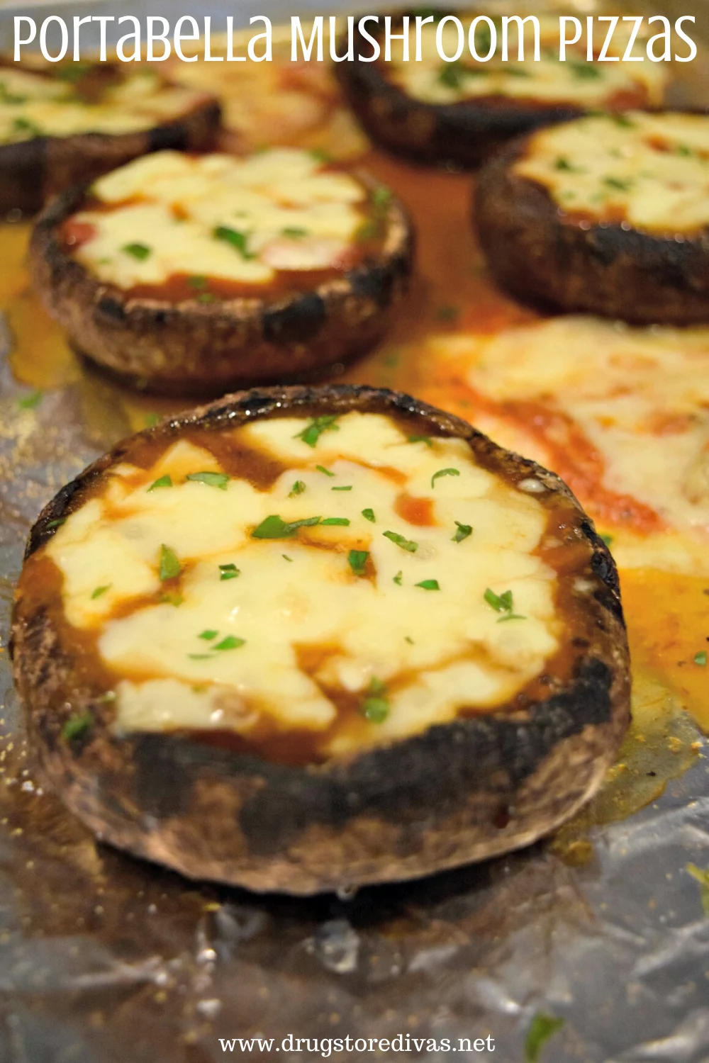 Portabella Mushroom Pizzas on foil.