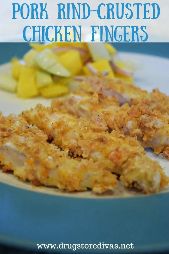 Pork Rind-Crusted Chicken Fingers on a plate with mango salsa.