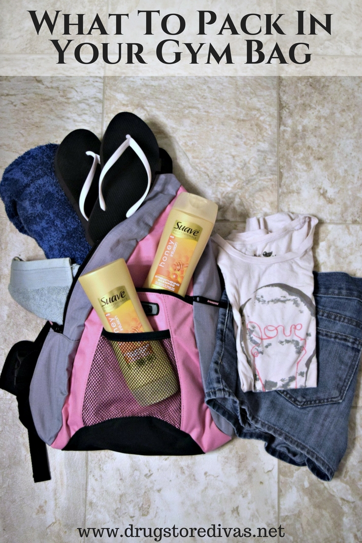 A gym back packed with a towel, flip flops, shampoo, and clothes with the words 