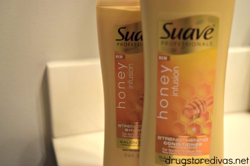 Two bottles of Suave products.