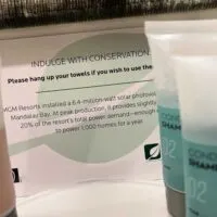 A sign from a hotel talking about the hotel's conservation policies with the words 