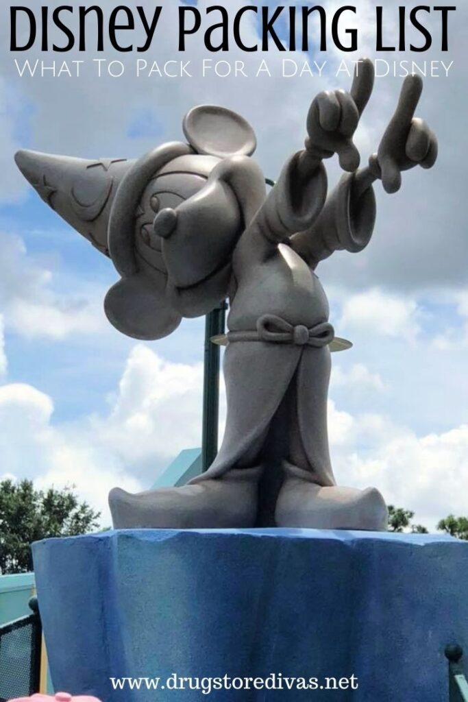 A Mickey Mouse statue with the words "Disney Packing List What To Pack For A Day At Disney" digitally written above it.