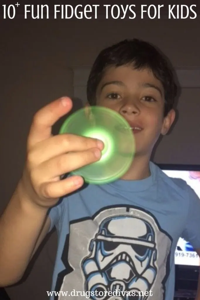 A boy playing with a green fidget spinner with the words "!10+ Fun Fidget Toys For Kids" digitally written on top.