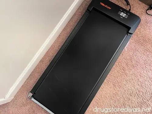 A walking pad on a carpet.