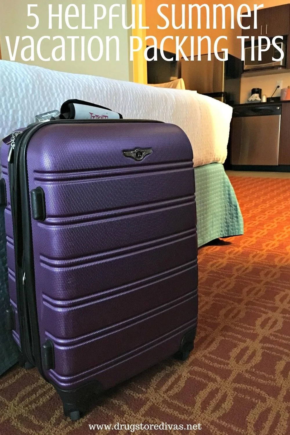 A suitcase in a hotel room with the words 