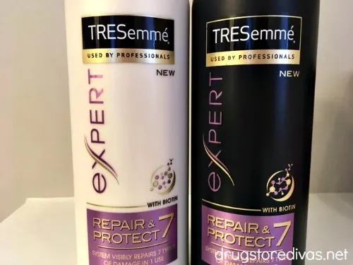 Two bottles of Tresemme products.